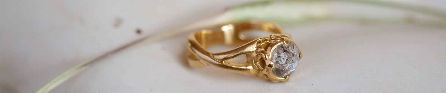 hand-carved gold and precious gemstones that evoke an old world aesthetic, it is a touchstone for your life–the transient marked by the enduring.