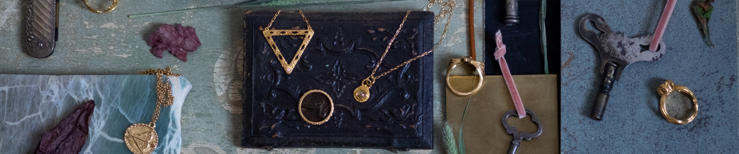 hand-carved gold and precious gemstones that evoke an old world aesthetic, it is a touchstone for your life–the transient marked by the enduring.