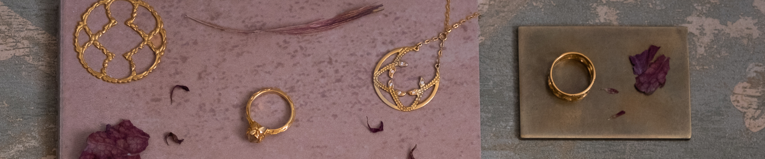 hand-carved gold and precious gemstones that evoke an old world aesthetic, it is a touchstone for your life–the transient marked by the enduring.