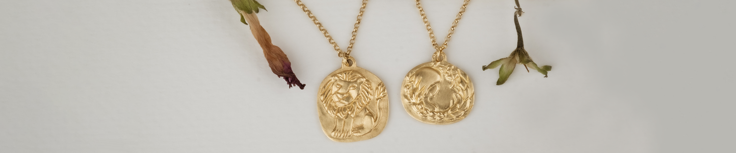 hand-carved gold and precious gemstones that evoke an old world aesthetic, it is a touchstone for your life–the transient marked by the enduring.