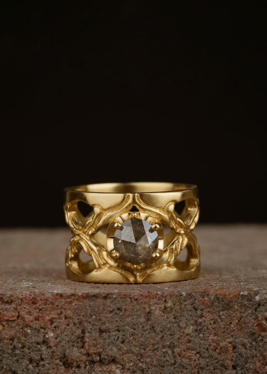 hand-carved gold and precious gemstones that evoke an old world aesthetic, it is a touchstone for your life–the transient marked by the enduring. 