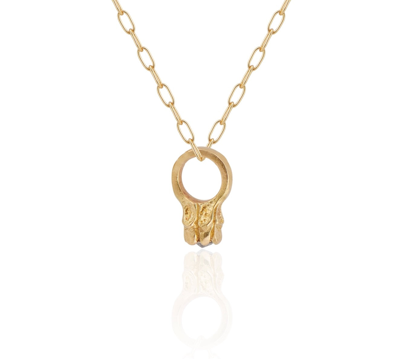Inspired by a set of rings purchased for a childhood crush, the Babbey necklace captures the magic of those innocent days, infused now with refined sophistication. Hand-crafted gold petals reveal a stunning diamond, creating a delicate ring-shaped pendant perfect for celebrating new motherhood, sisterhood, friendship—or the promise of love in bloom.