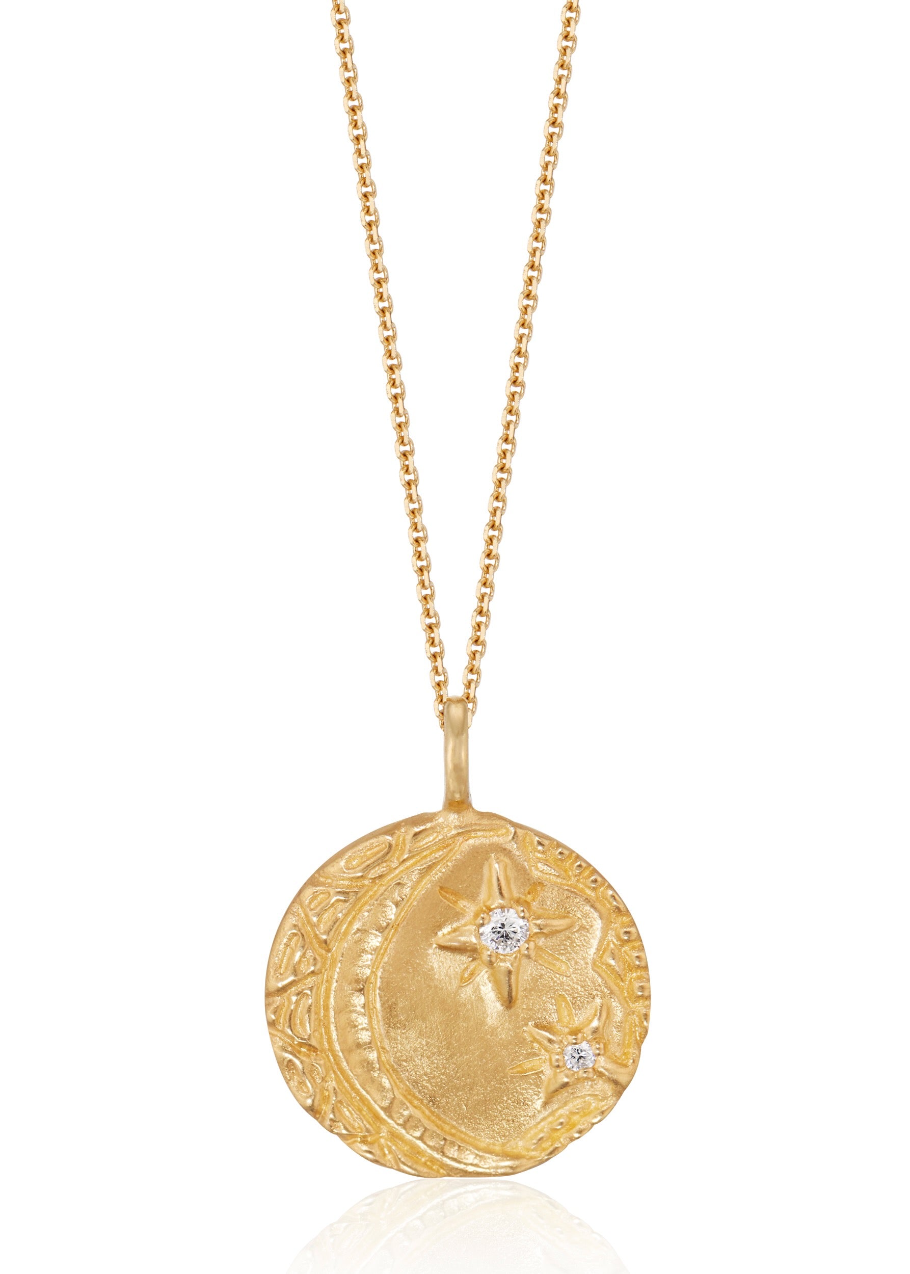 Cheers to the night owls. To the tender souls who create magic in the dark, who carry the secrets of the stars. The Night Owl is a gold pendant necklace that shines with a delicate, hand-textured crescent moon that cradles two diamond stars–an homage to an eternal love that exists beyond boundaries of space and time.