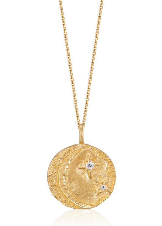 Cheers to the night owls. To the tender souls who create magic in the dark, who carry the secrets of the stars. The Night Owl is a gold pendant necklace that shines with a delicate, hand-textured crescent moon that cradles two diamond stars–an homage to an eternal love that exists beyond boundaries of space and time.