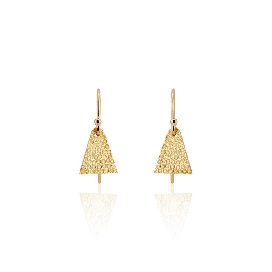 Evocative of the tassel rings worn by a beloved aunt, the triangular shape of the Burr earring represents the strength of the woman who inspired it. An intricate hand-crafted texture plays up the light with each turn of the head.