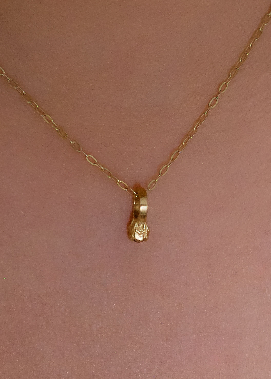 Inspired by a set of rings purchased for a childhood crush, the Babbey necklace captures the magic of those innocent days, infused now with refined sophistication. Hand-crafted gold petals reveal a stunning diamond, creating a delicate ring-shaped pendant perfect for celebrating new motherhood, sisterhood, friendship—or the promise of love in bloom.