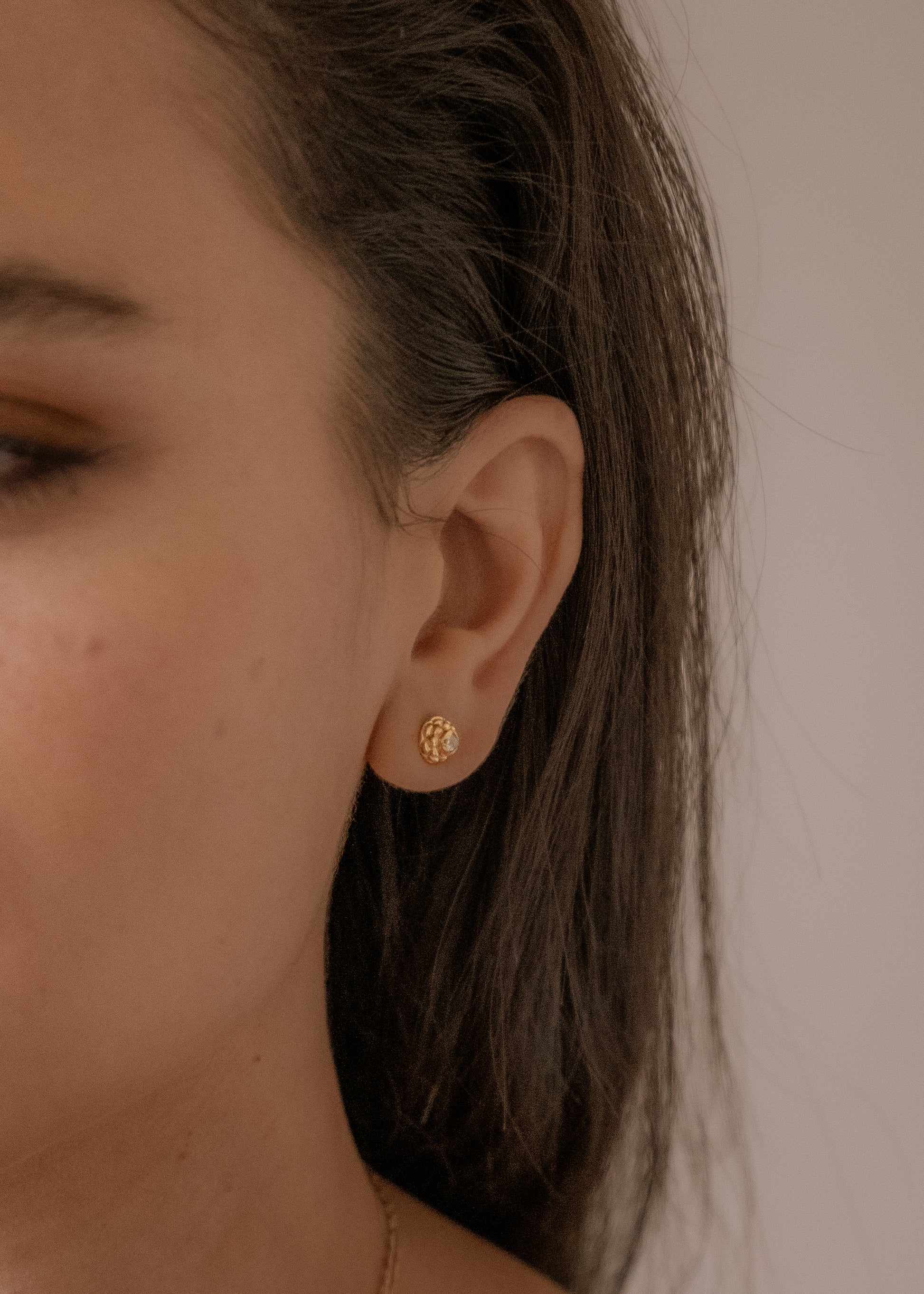 Featuring intricate hand-carved beads that center around brilliant rose cut diamonds, the Marquis earring is fit for royalty and reimagined for everyday wear.
