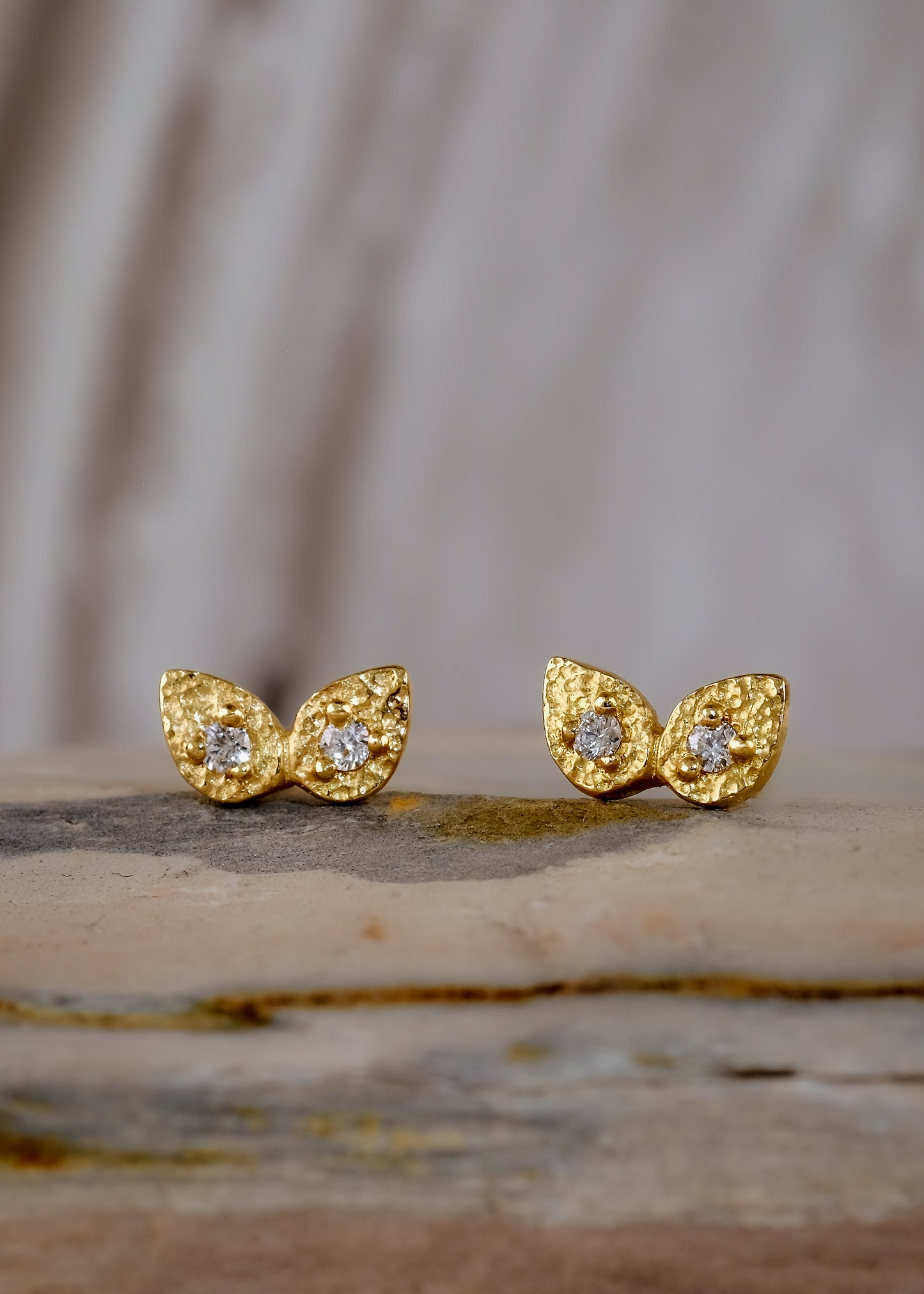 Two brilliant diamonds are joined at the base to create the wing-shaped Twin earring— a nod to the beauty of belonging to another while inviting individuality to take flight.