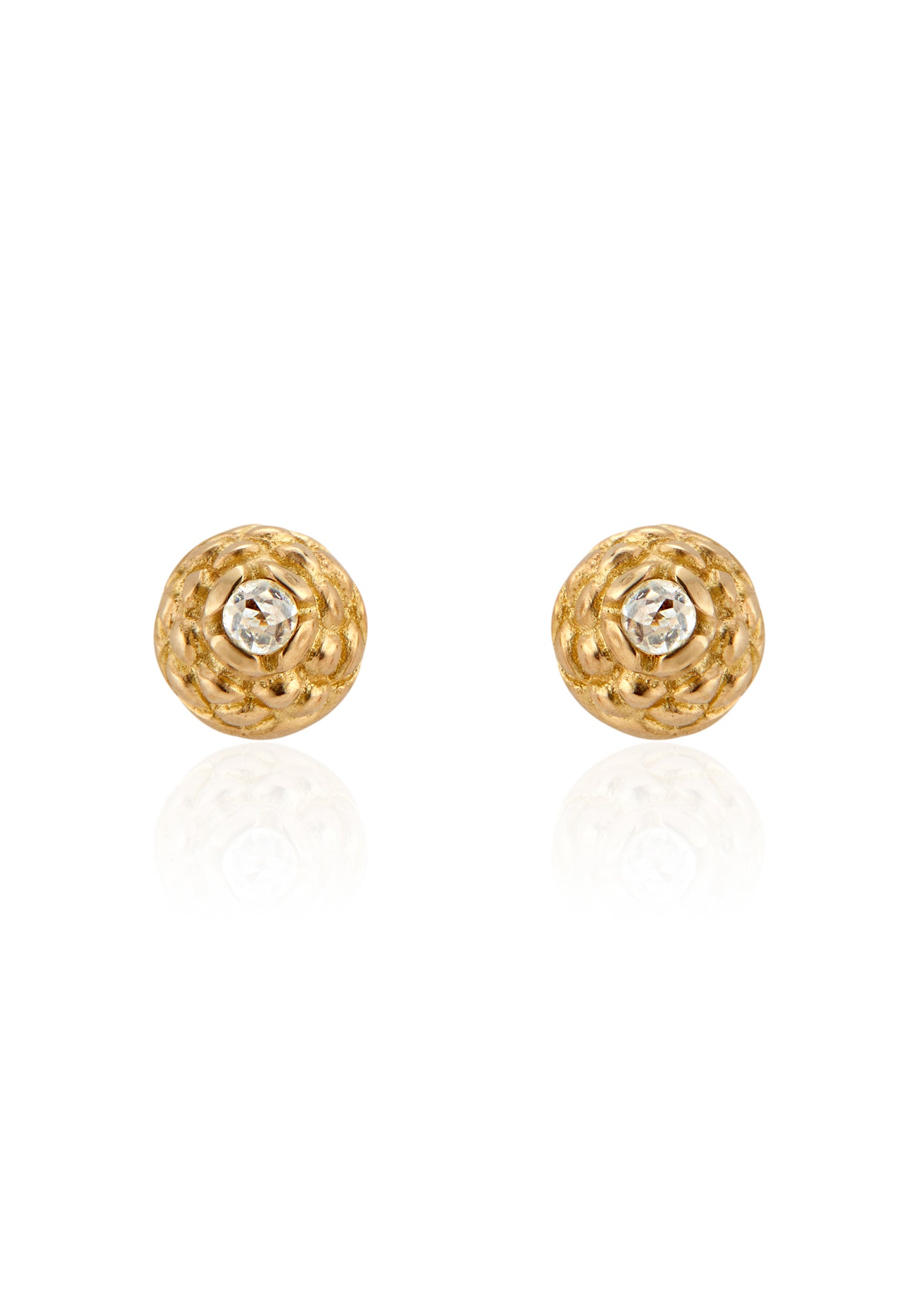 Featuring intricate hand-carved beads that center around brilliant rose cut diamonds, the Marquis earring is fit for royalty and reimagined for everyday wear.
