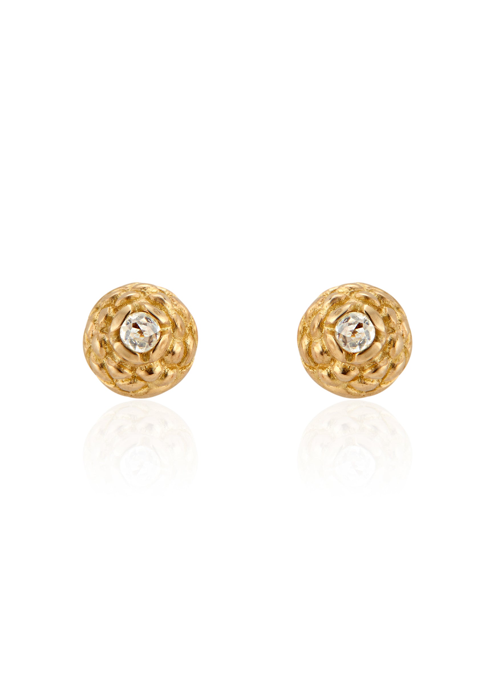 Featuring intricate hand-carved beads that center around brilliant rose cut diamonds, the Marquis earring is fit for royalty and reimagined for everyday wear.
