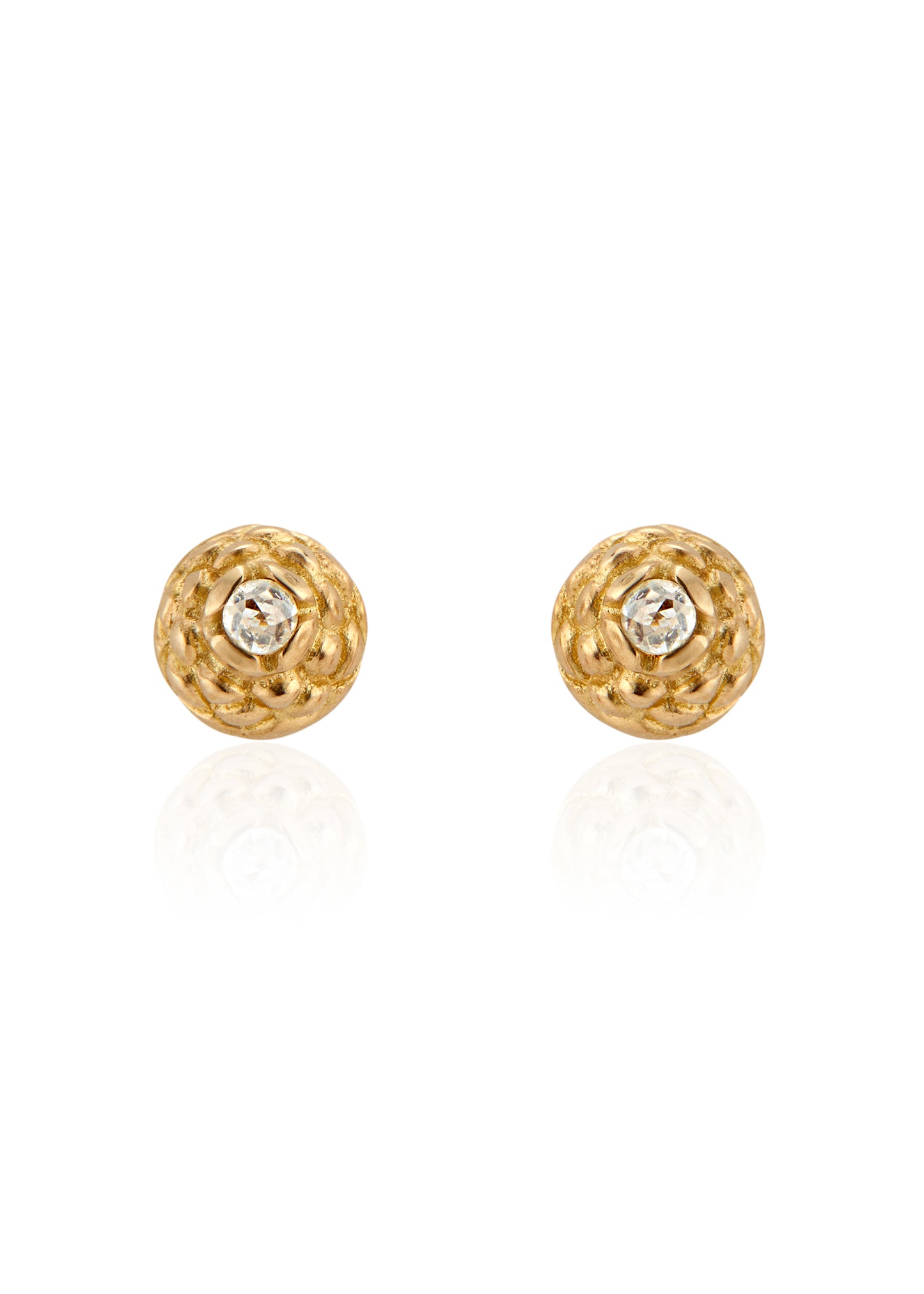 Featuring intricate hand-carved beads that center around brilliant rose cut diamonds, the Marquis earring is fit for royalty and reimagined for everyday wear. 