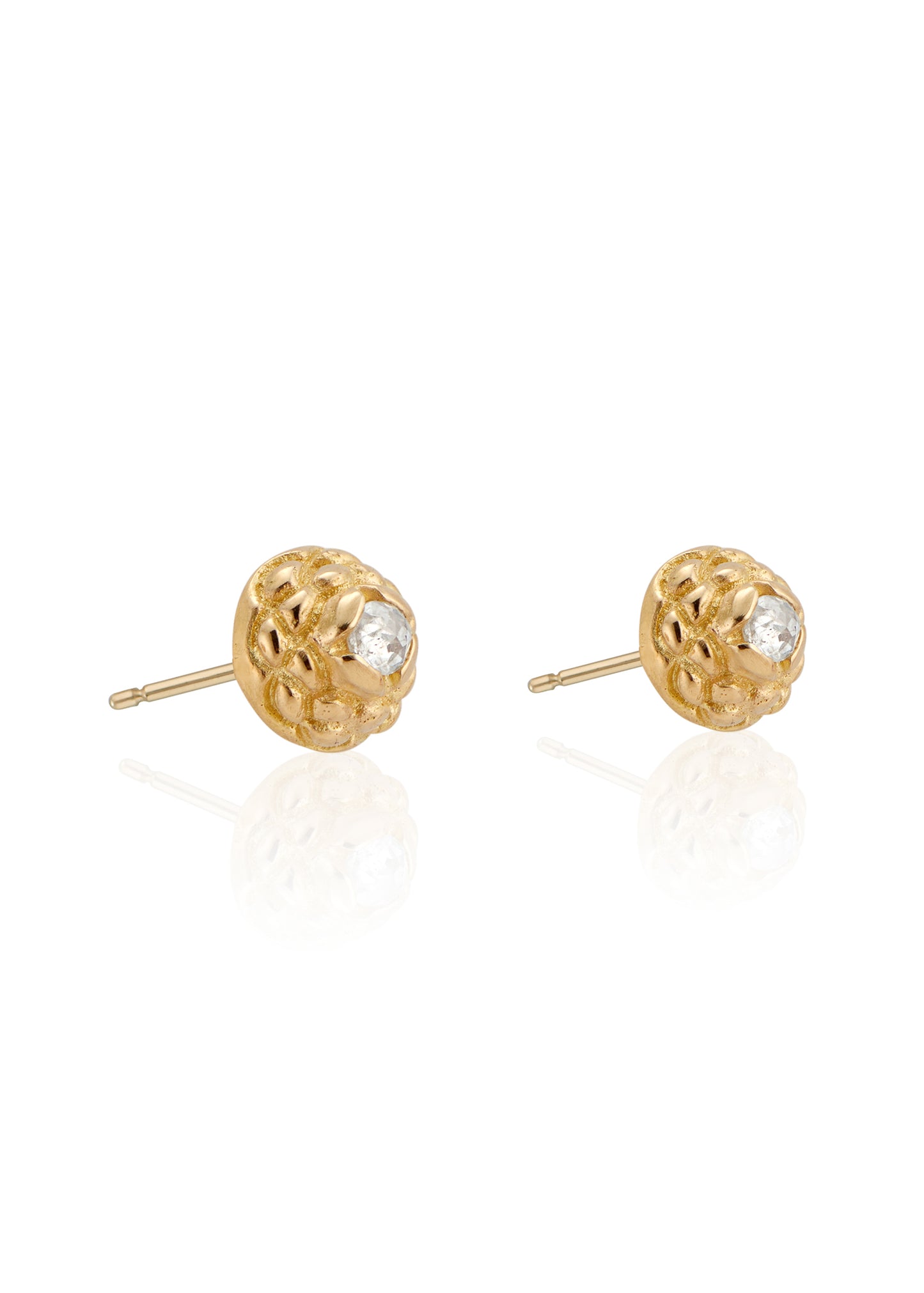 Featuring intricate hand-carved beads that center around brilliant rose cut diamonds, the Marquis earring is fit for royalty and reimagined for everyday wear.