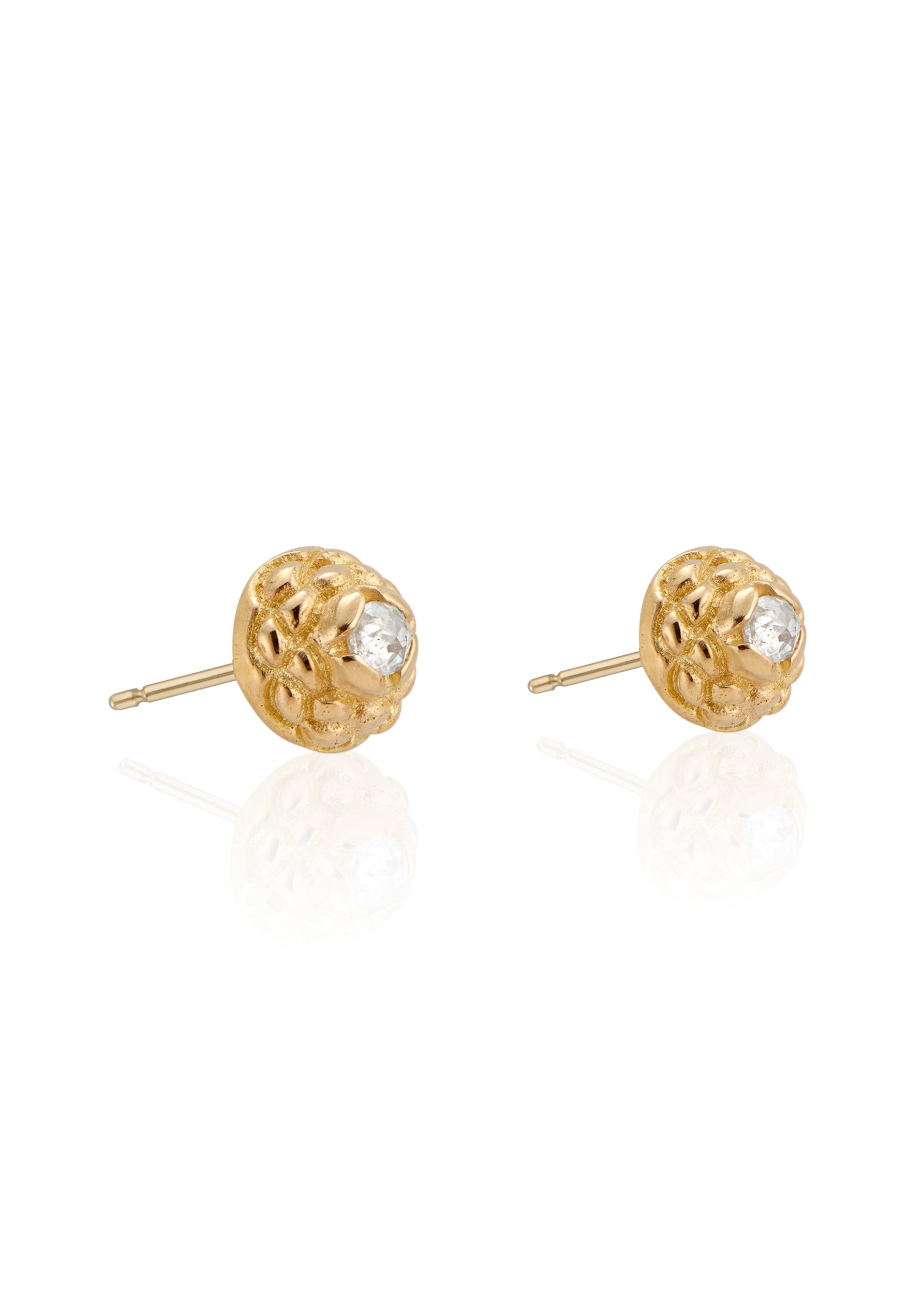 Featuring intricate hand-carved beads that center around brilliant rose cut diamonds, the Marquis earring is fit for royalty and reimagined for everyday wear.