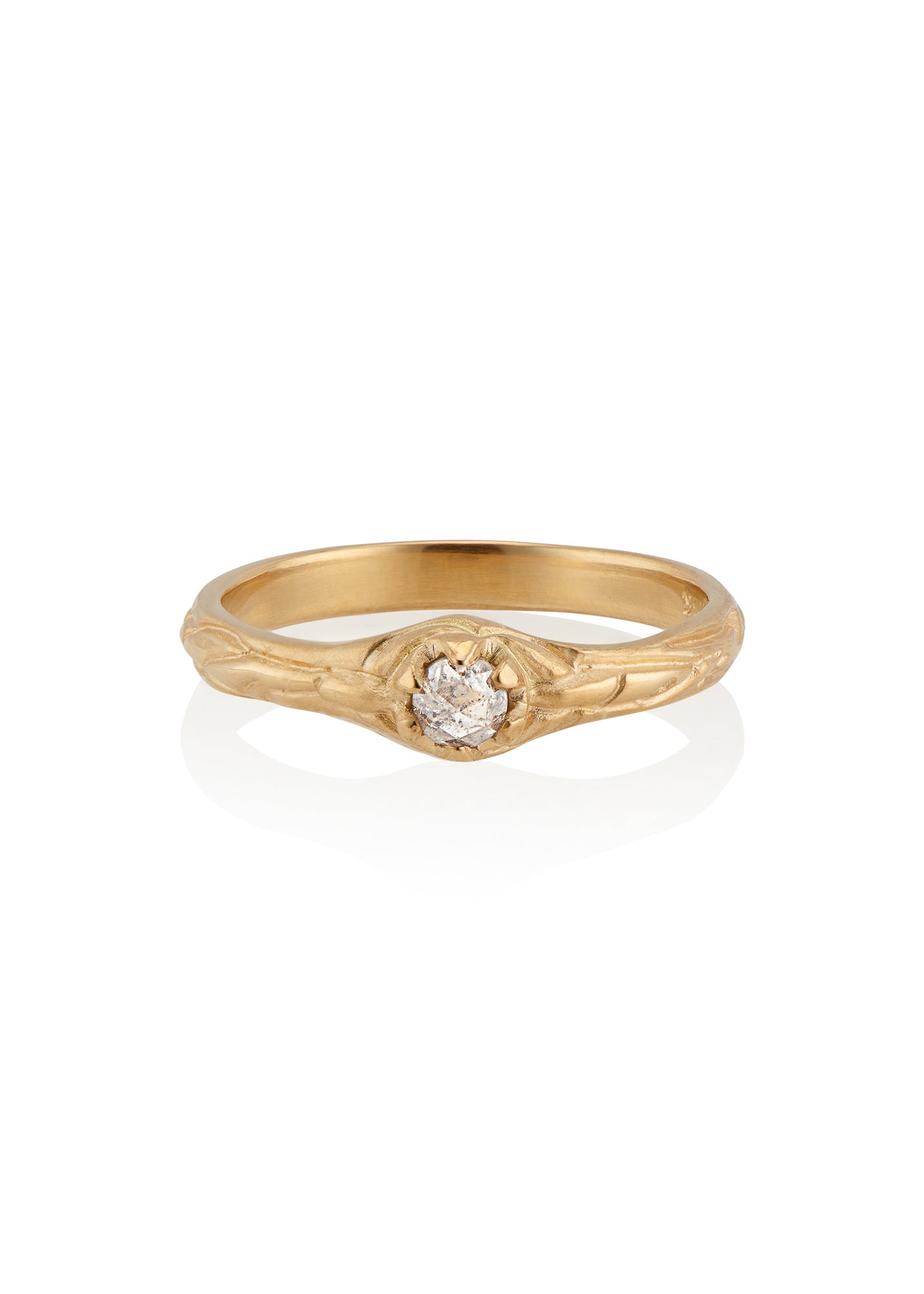 Inspired by the southern constellation, the Ara ring reflects the brilliance of the night sky with a rose cut diamond that sits flush against a hand-carved gold band—a piece as timeless as the stars themselves.
