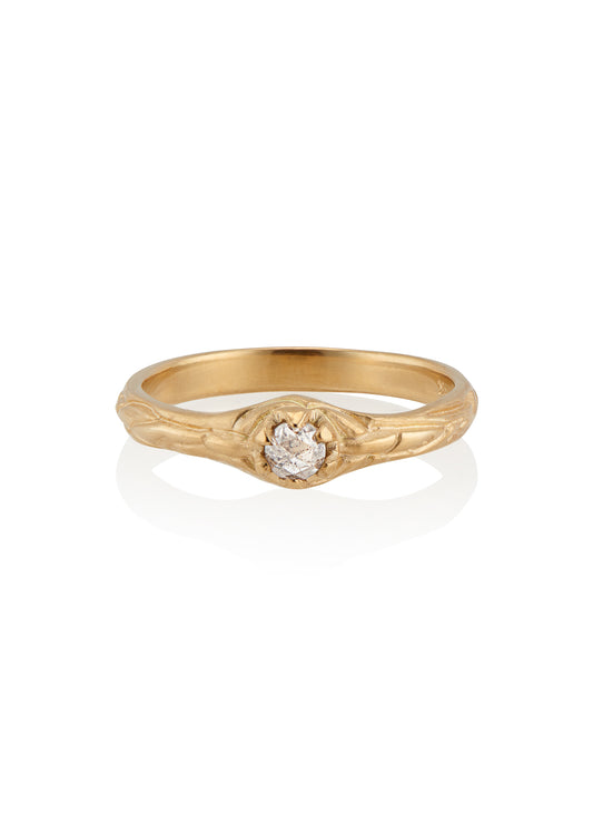 Inspired by the southern constellation, the Ara ring reflects the brilliance of the night sky with a rose cut diamond that sits flush against a hand-carved gold band—a piece as timeless as the stars themselves.