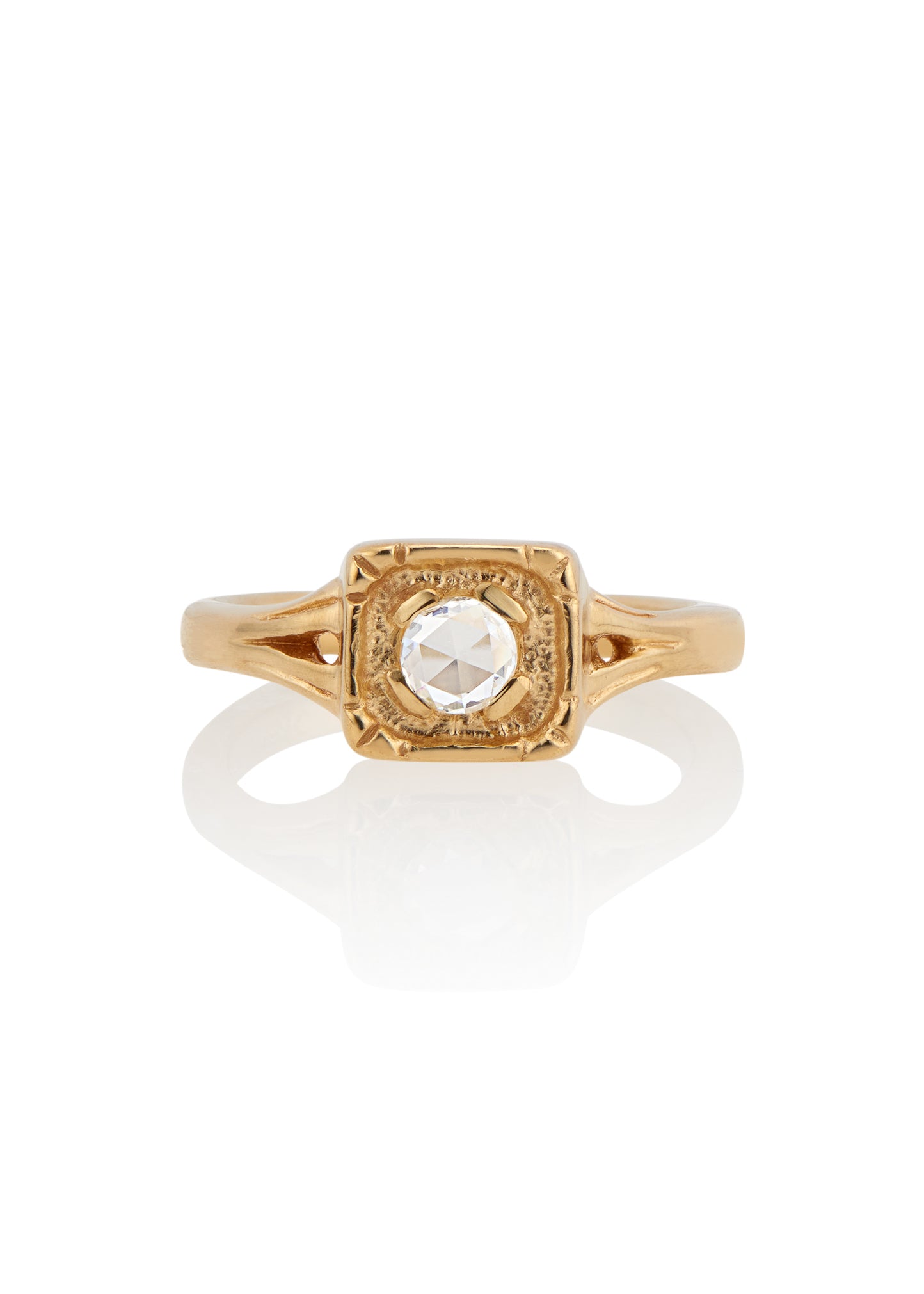 Modern lines intersect with an antique aesthetic to create the Chamber ring, a square setting of textured gold that houses a recessed rose cut diamond— strong and substantial, a meaningful connection to the past and present.