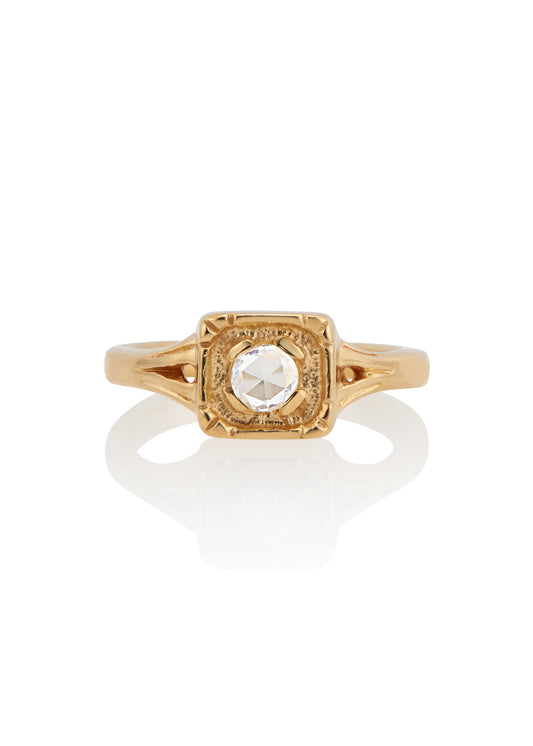 Modern lines intersect with an antique aesthetic to create the Chamber ring, a square setting of textured gold that houses a recessed rose cut diamond— strong and substantial, a meaningful connection to the past and present.