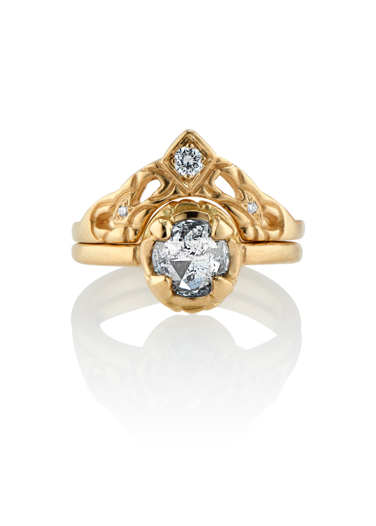 Named for Empress Josephine, this ring pairs perfectly with the Empress nesting band. Still stunning on its own, this ring features a rose cut diamond set securely within four prongs— a minimalist setting that marries a modern aesthetic with echoes of the past.