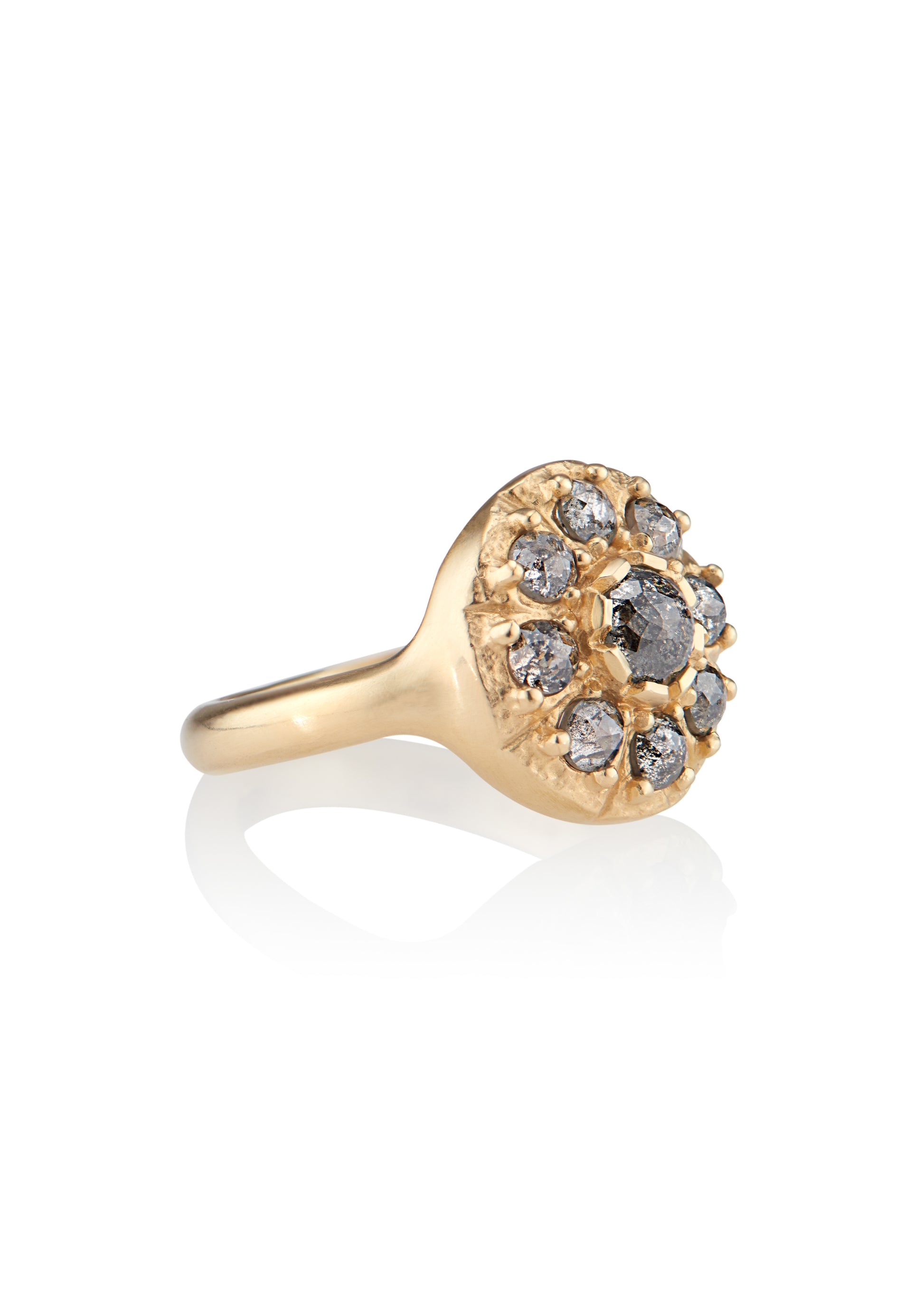 Capturing the richness and romance of its eponymous era, the Georgian ring boasts an exquisite arrangement of rose cut diamonds that celebrates the marriage between gold and stone. As timeless as it is beautiful, this piece is an instant heirloom—classic, ornate and otherworldly.
