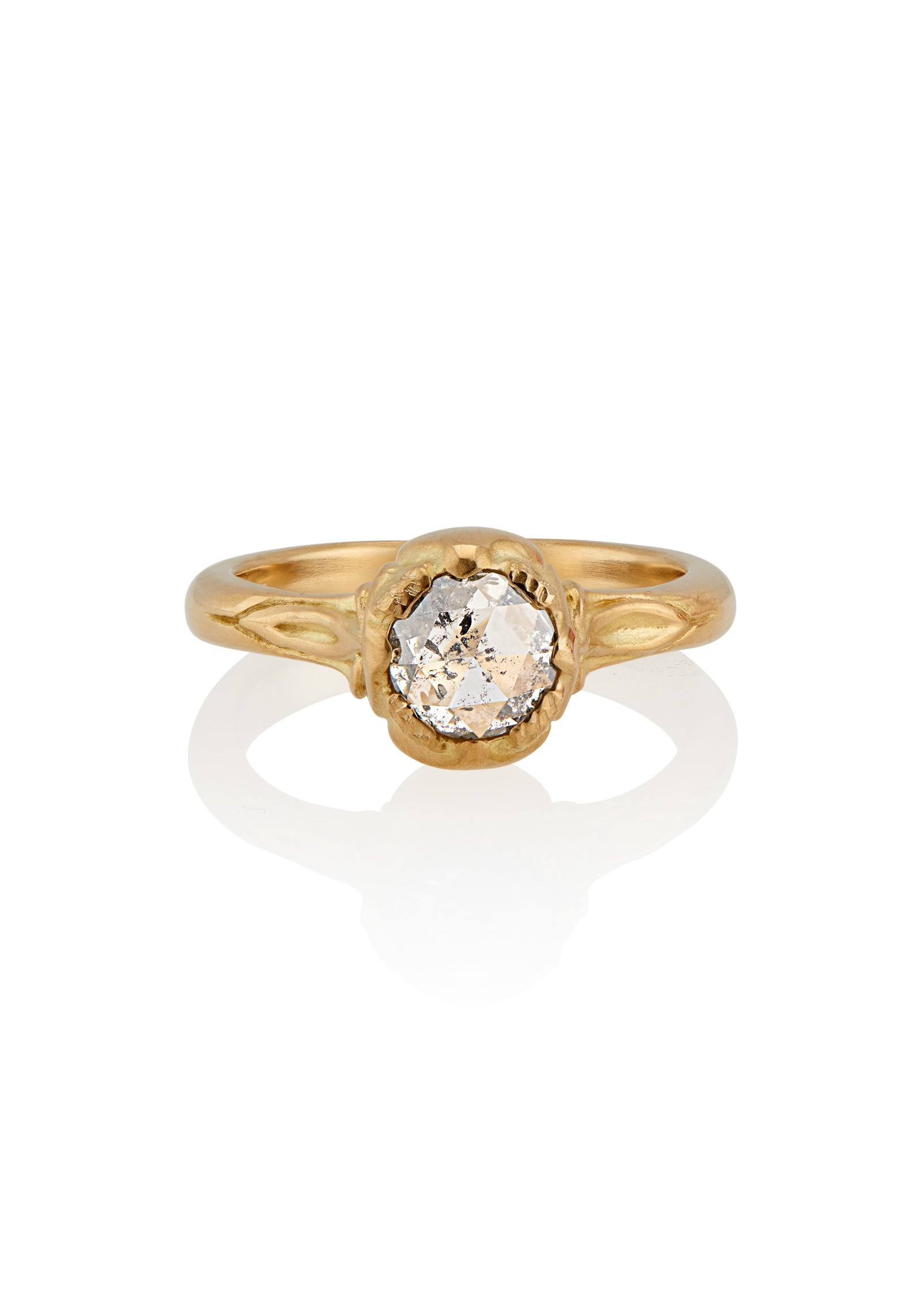 Taking its cue from nature, the Sepal ring captures the intricacy of layered flower petals rendered in gold, revealing a precious rose cut diamond—a refined piece that’s as timeless and beautiful as the botanical world.
