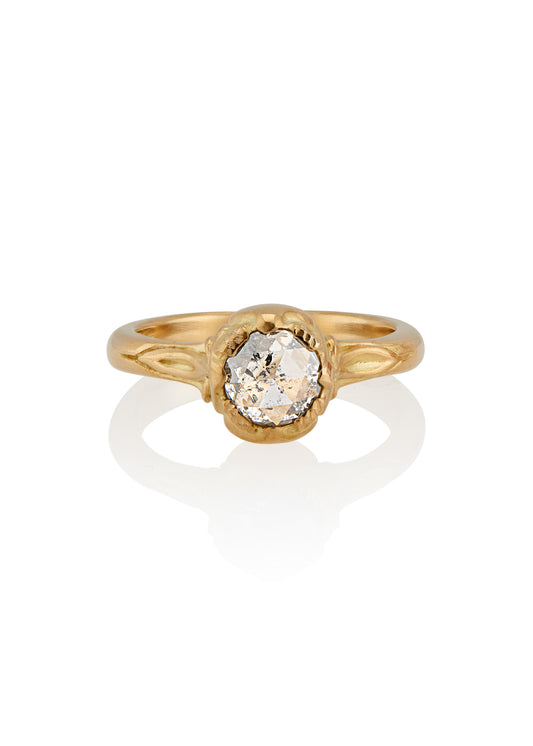 Taking its cue from nature, the Sepal ring captures the intricacy of layered flower petals rendered in gold, revealing a precious rose cut diamond—a refined piece that’s as timeless and beautiful as the botanical world.
