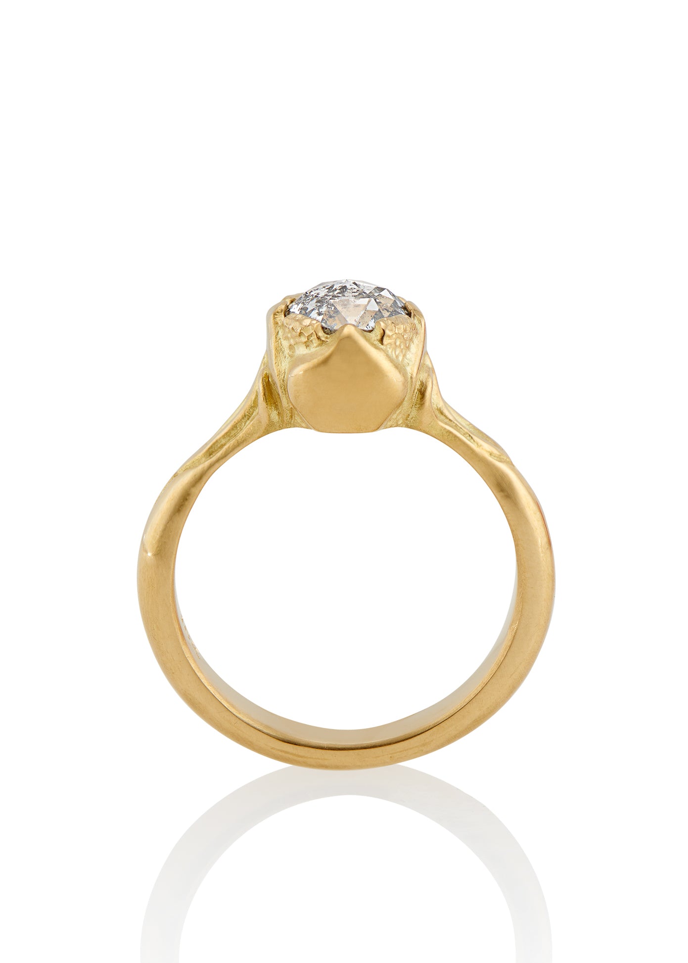 Taking its cue from nature, the Sepal ring captures the intricacy of layered flower petals rendered in gold, revealing a precious rose cut diamond—a refined piece that’s as timeless and beautiful as the botanical world.