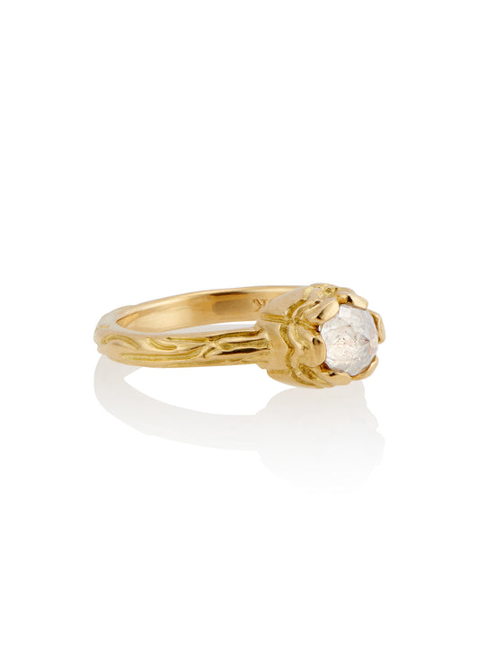 Inspired by windswept castles that emerge from the mist, the Turret ring rises high on the finger to reveal an exquisite rose cut diamond—a ring worthy of fairytales, created for the magic of real life.