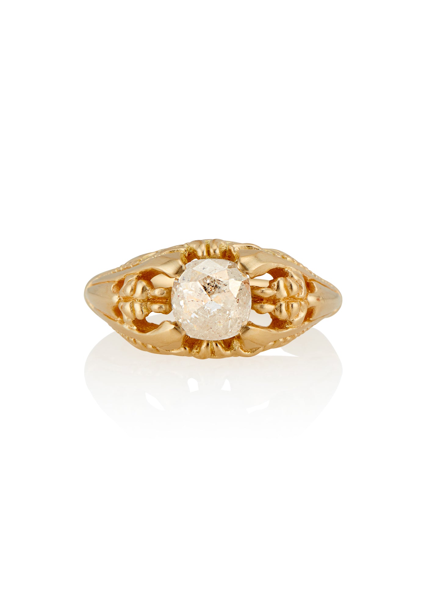 Capturing the ornate details of the Victorian era, the Violette ring was inspired by the love between Prince Albert and Queen Victoria. A substantial gold band is rich in intricate detail, showcasing craftsmanship with each bead, curve and open space. A stunning rose cut diamond sits flush among the prongs, creating a romantic ring to cherish for the ages.