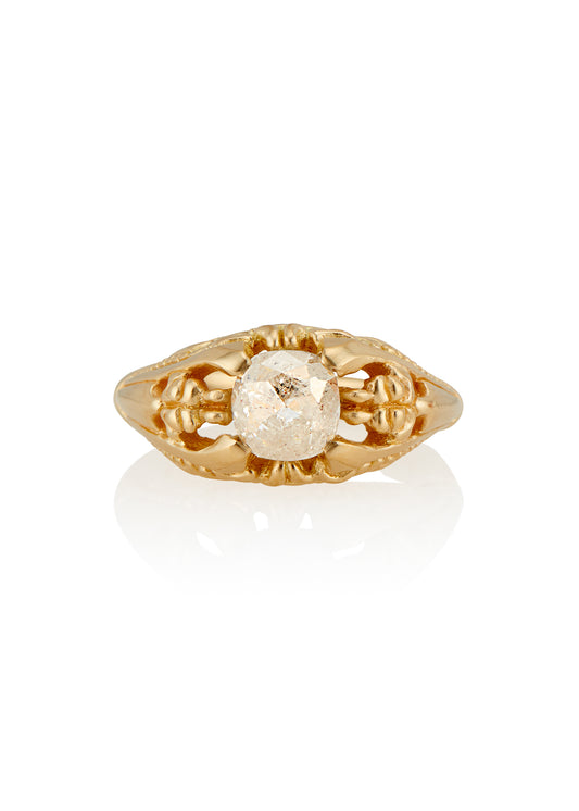 Capturing the ornate details of the Victorian era, the Violette ring was inspired by the love between Prince Albert and Queen Victoria. A substantial gold band is rich in intricate detail, showcasing craftsmanship with each bead, curve and open space. A stunning rose cut diamond sits flush among the prongs, creating a romantic ring to cherish for the ages.