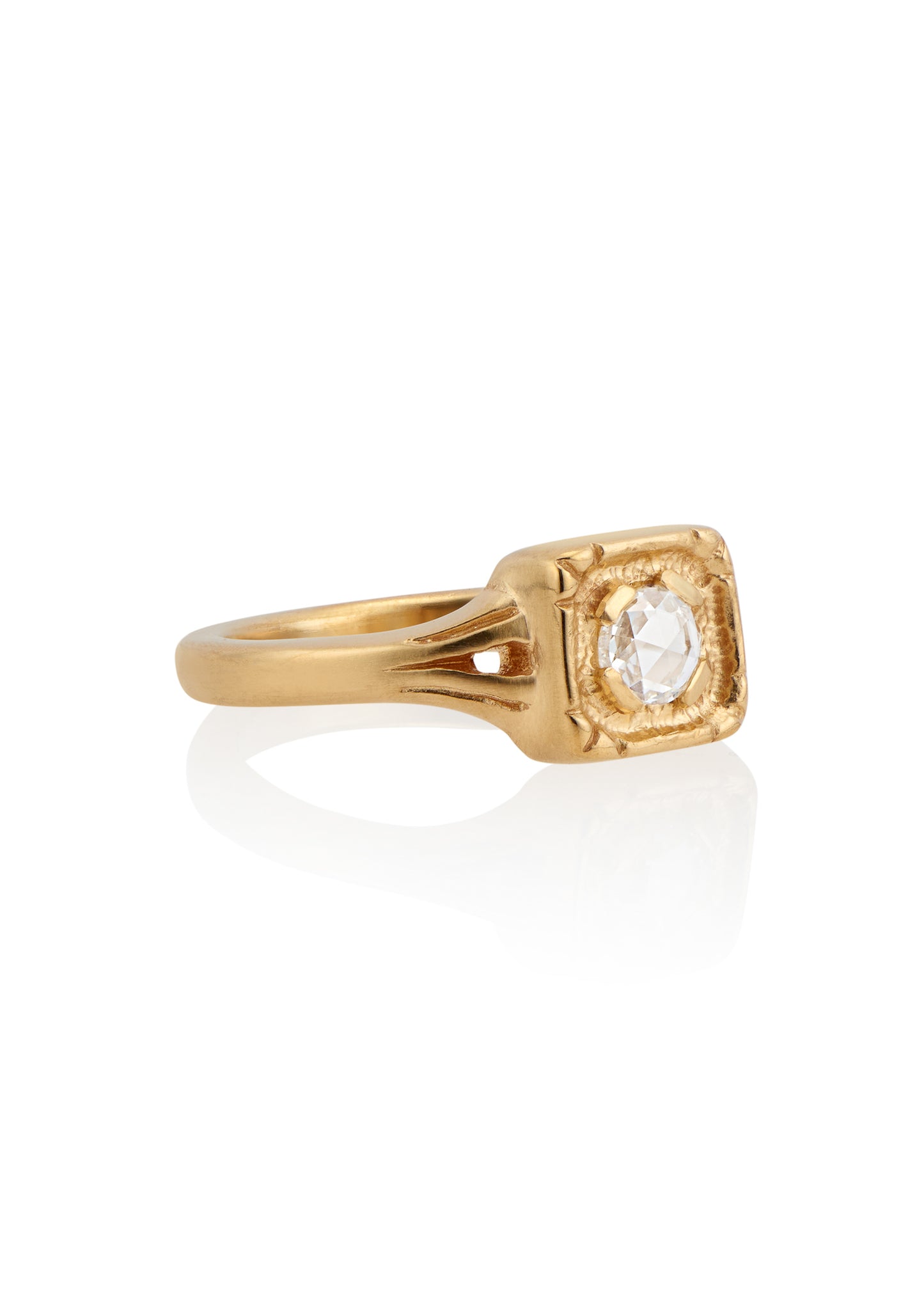 Modern lines intersect with an antique aesthetic to create the Chamber ring, a square setting of textured gold that houses a recessed rose cut diamond— strong and substantial, a meaningful connection to the past and present.