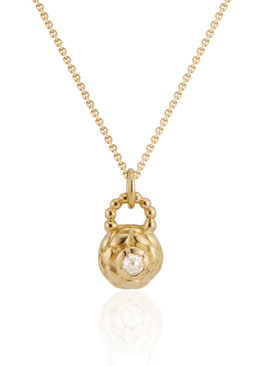 Featuring intricate hand-carved beads that center around a brilliant rose cut diamond, the Marquis necklace is fit for royalty and reimagined for everyday wear.
