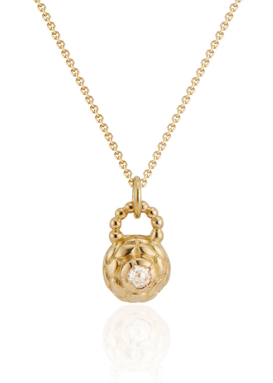 Featuring intricate hand-carved beads that center around a brilliant rose cut diamond, the Marquis necklace is fit for royalty and reimagined for everyday wear.