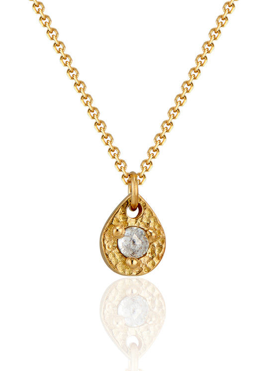 A romantic journey that transcends time. The Drop necklace merges a circle of understated hand-carved gold beads with ornate rose cut diamonds for a dangling romantic style that feels as at home today as it does in an antique jewelry box. 