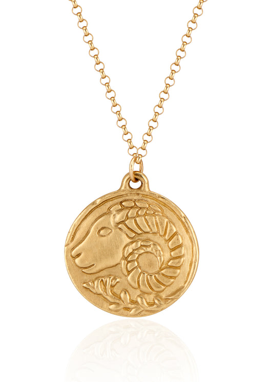 The first sign of the Zodiac, fire sign Aries harkens new beginnings and embodies action. A hand-carved Ram, dignified and strong, graces this pendant—a necklace that captures the power of the celestial sky.