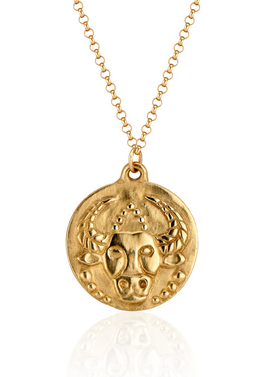 The second sign of the Zodiac, Earth sign Taurus seeks beauty and gives love fearlessly. A hand-carved bull, spiritual and wise, graces this pendant—creating a necklace that captures the power of the celestial sky. 