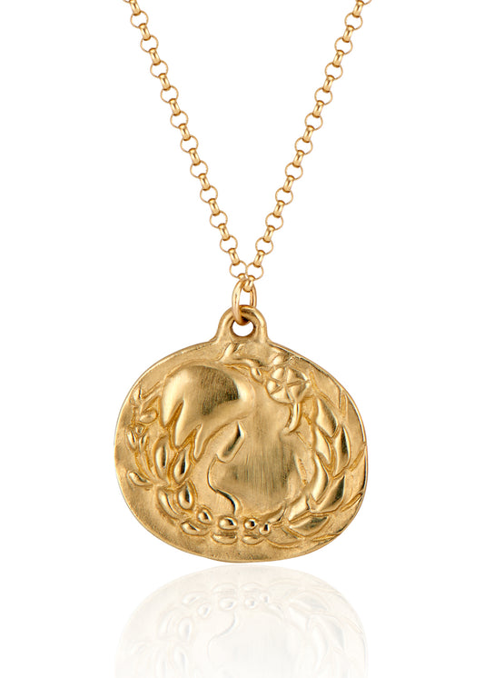 The sixth sign of the Zodiac, Earth sign Virgo is a tender humanitarian of strong character with an unparalleled eye for detail. A hand-carved goddess—surrounded by flowers and wearing a braid that turns into a sheaf— creates a necklace that captures the power of the celestial sky.