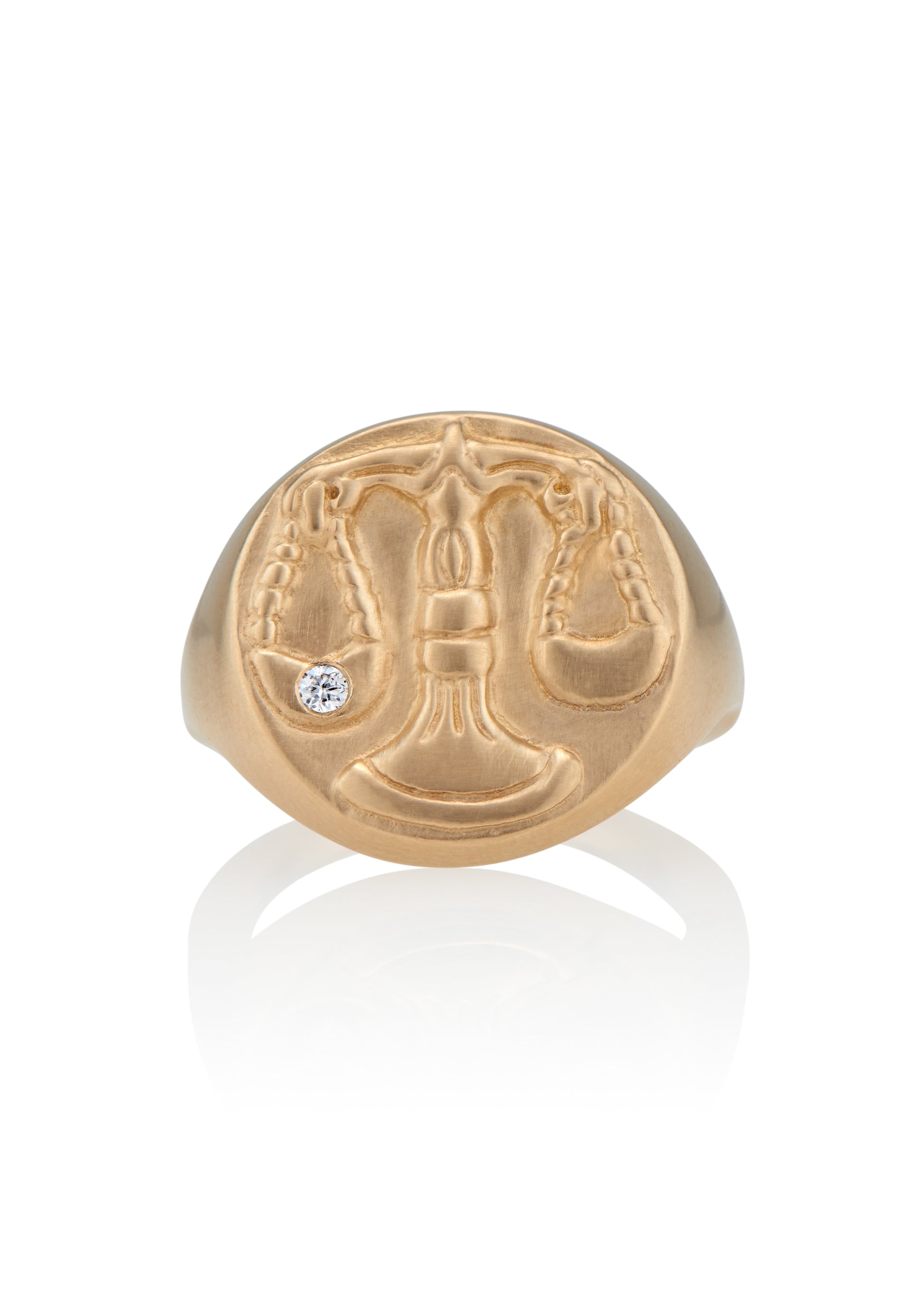 The seventh sign of the Zodiac, air sign Libra is an egalitarian peacemaker in search of harmony.  Hand-carved scales of justice grace this pendant, creating a necklace that captures the power of the celestial sky.