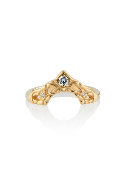 Created for a friend to perfectly compliment her engagement ring, the Empress is a nesting ring that evokes a priceless tiara. A diamond sits high atop an arched band, hand-carved with intricate detail. Two smaller diamonds sparkle on either side, creating a timeless and cherished heirloom.
