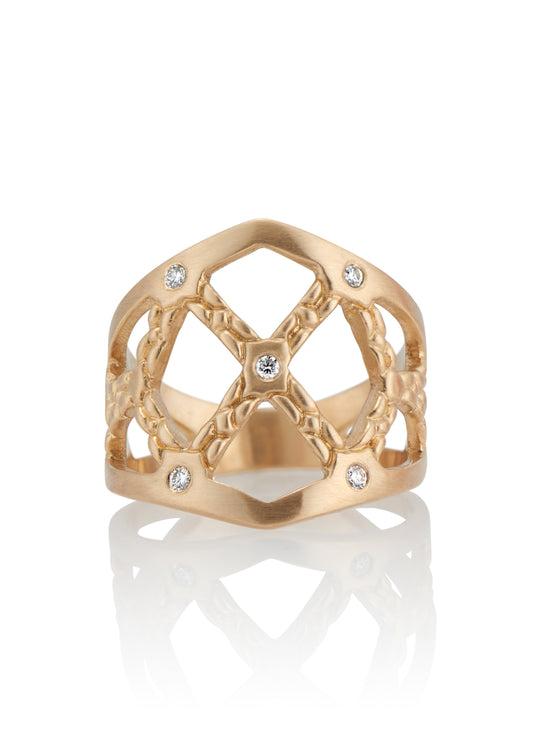 Named for the Norse goddess of love, gold and beauty, the Freya ring encapsulates fierce strength and unparalleled magnificence. Gold bands, both smooth and textured, criss cross around the finger to create open space—an architectural aegis highlighted by sparkling diamonds.