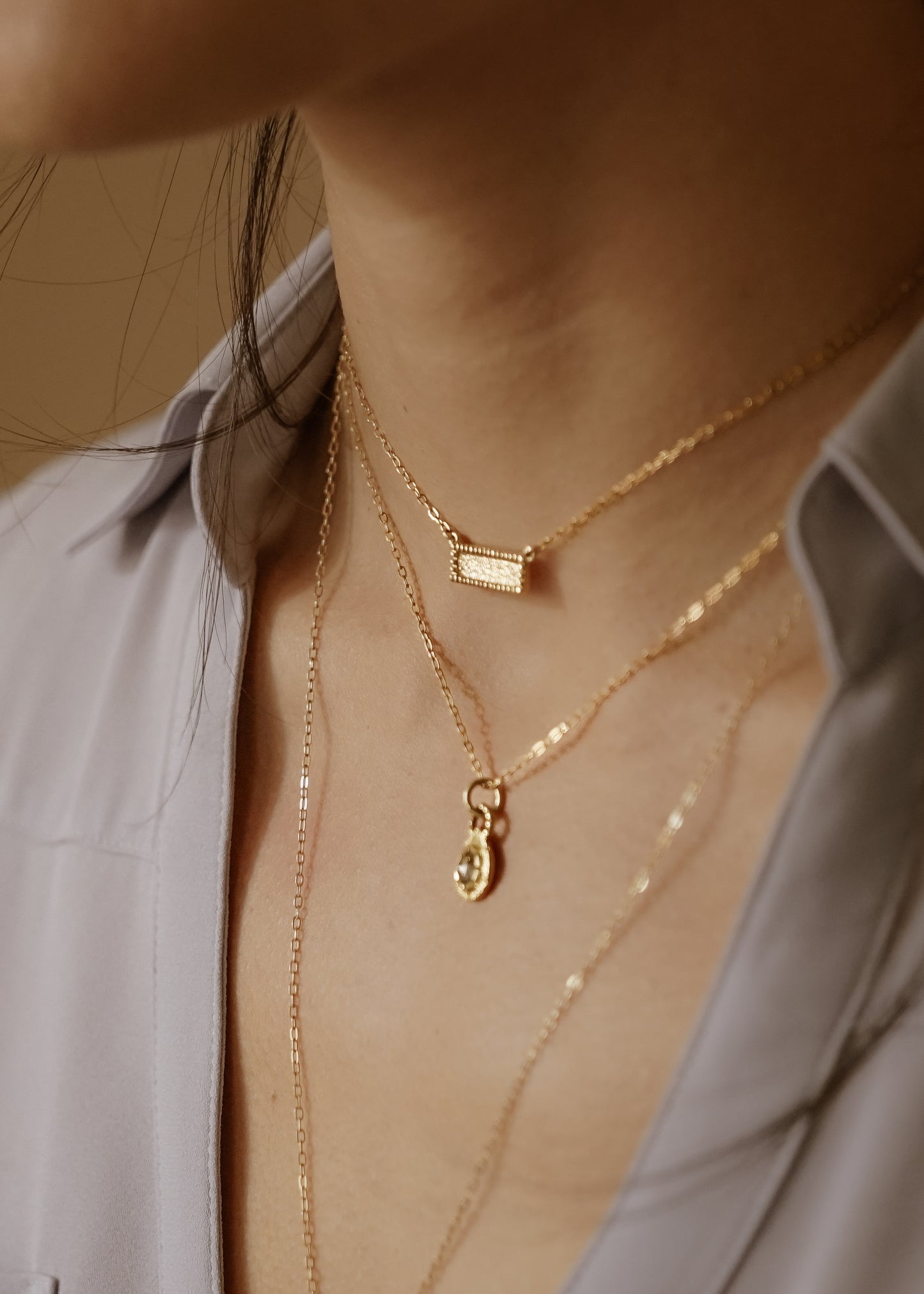 Let the details that speak to you come into focus. The Frame necklace is a study in craftsmanship, at once delicate and substantial. Beaded framework surrounds textured gold for a timeless and eye-catching necklace.