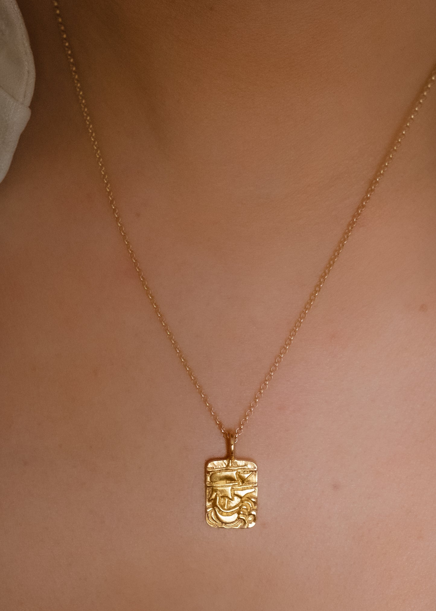 Arising from the swells of a stormy sea, the hand-carved ship of the Phantom necklace graces this substantial rectangular pendant— a timeless piece that echoes the mythic adventures of days past.