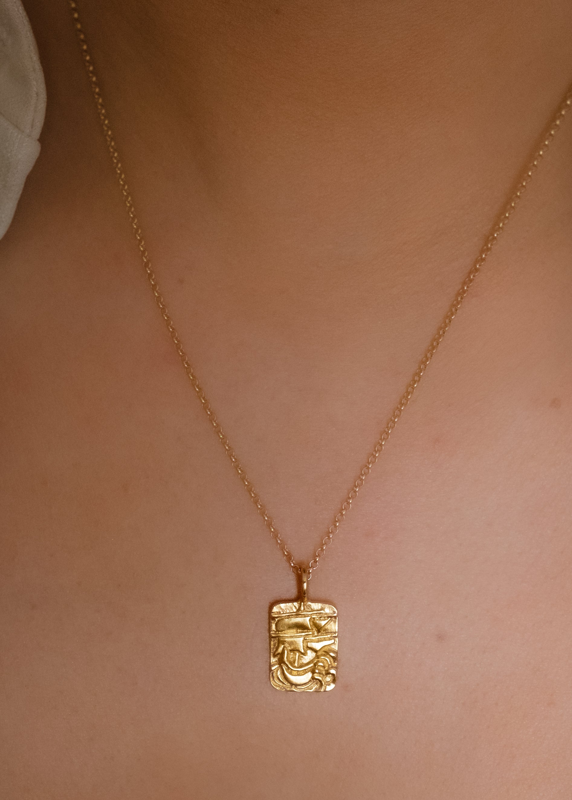 Arising from the swells of a stormy sea, the hand-carved ship of the Phantom necklace graces this substantial rectangular pendant— a timeless piece that echoes the mythic adventures of days past.