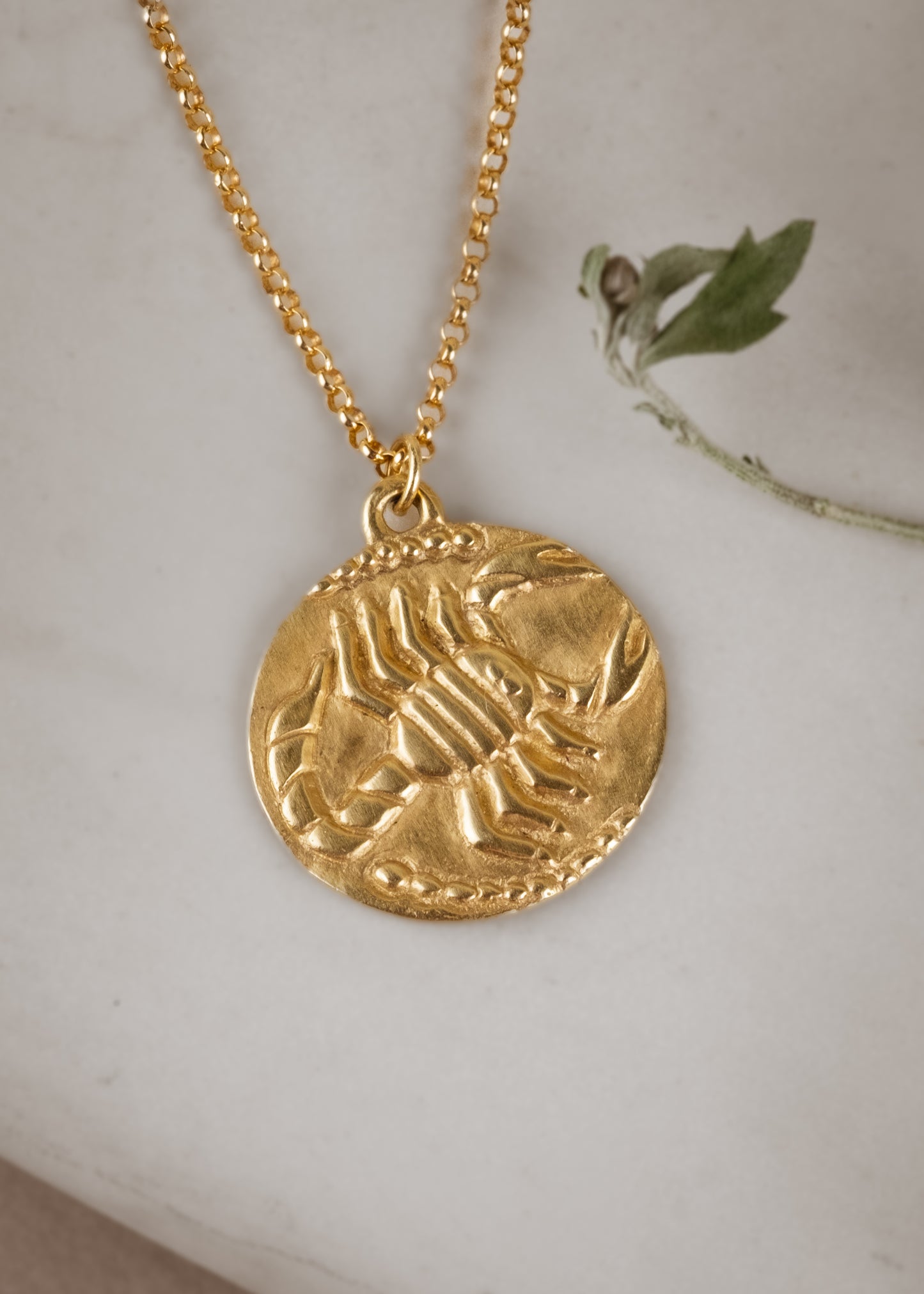 The eighth sign of the Zodiac, water sign Scorpio is a passionate truth-seeker who leads with decisiveness. A hand-carved, fierce yet whimsical scorpion graces this pendant, creating a necklace that captures the power of the celestial sky.