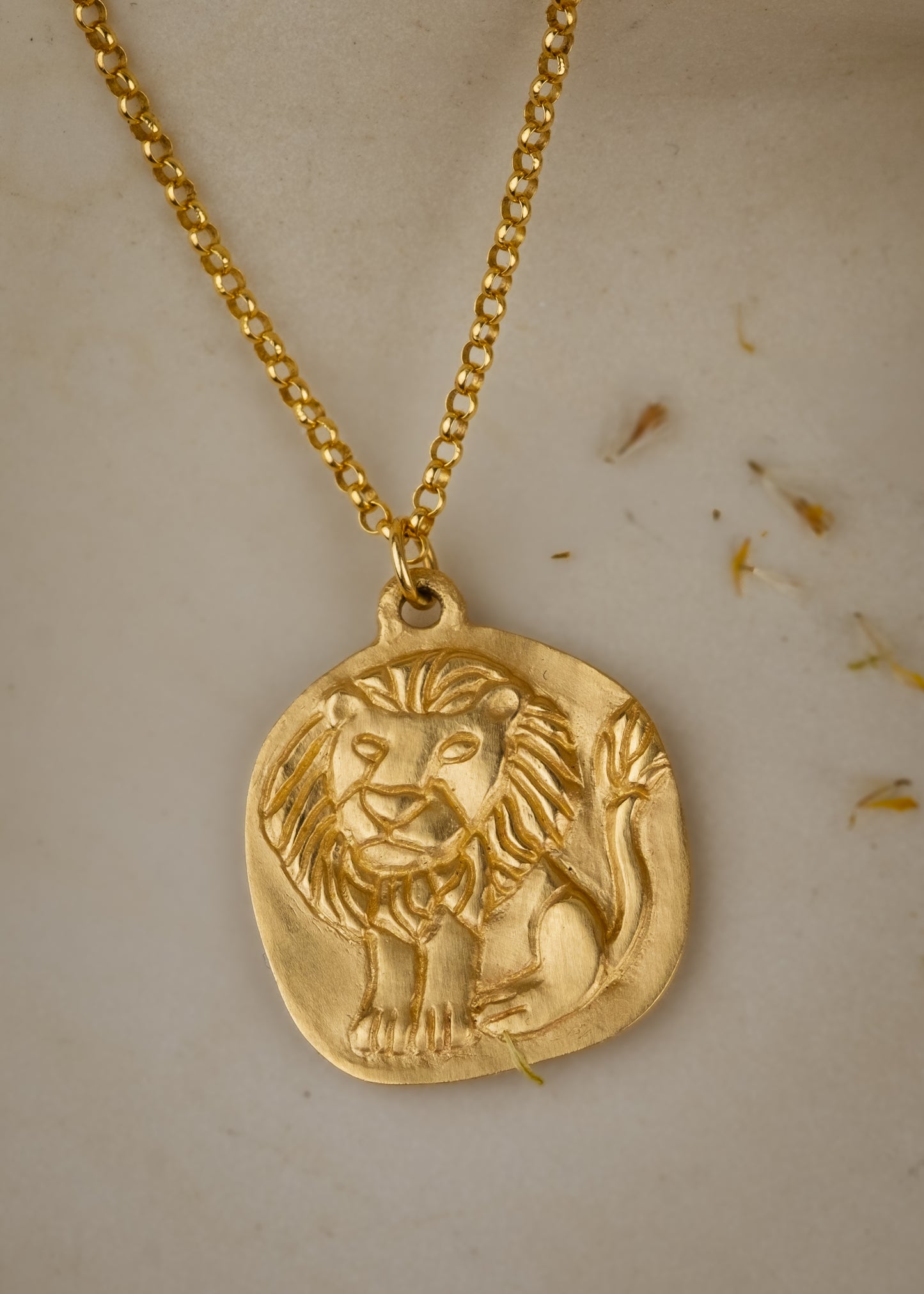 The fifth sign of the Zodiac, fire sign Leo is a natural leader, strong and creative in their approach to the world. A hand-carved, whimsical-yet-mighty little lion graces this pendant, creating a necklace that captures the power of the celestial sky.