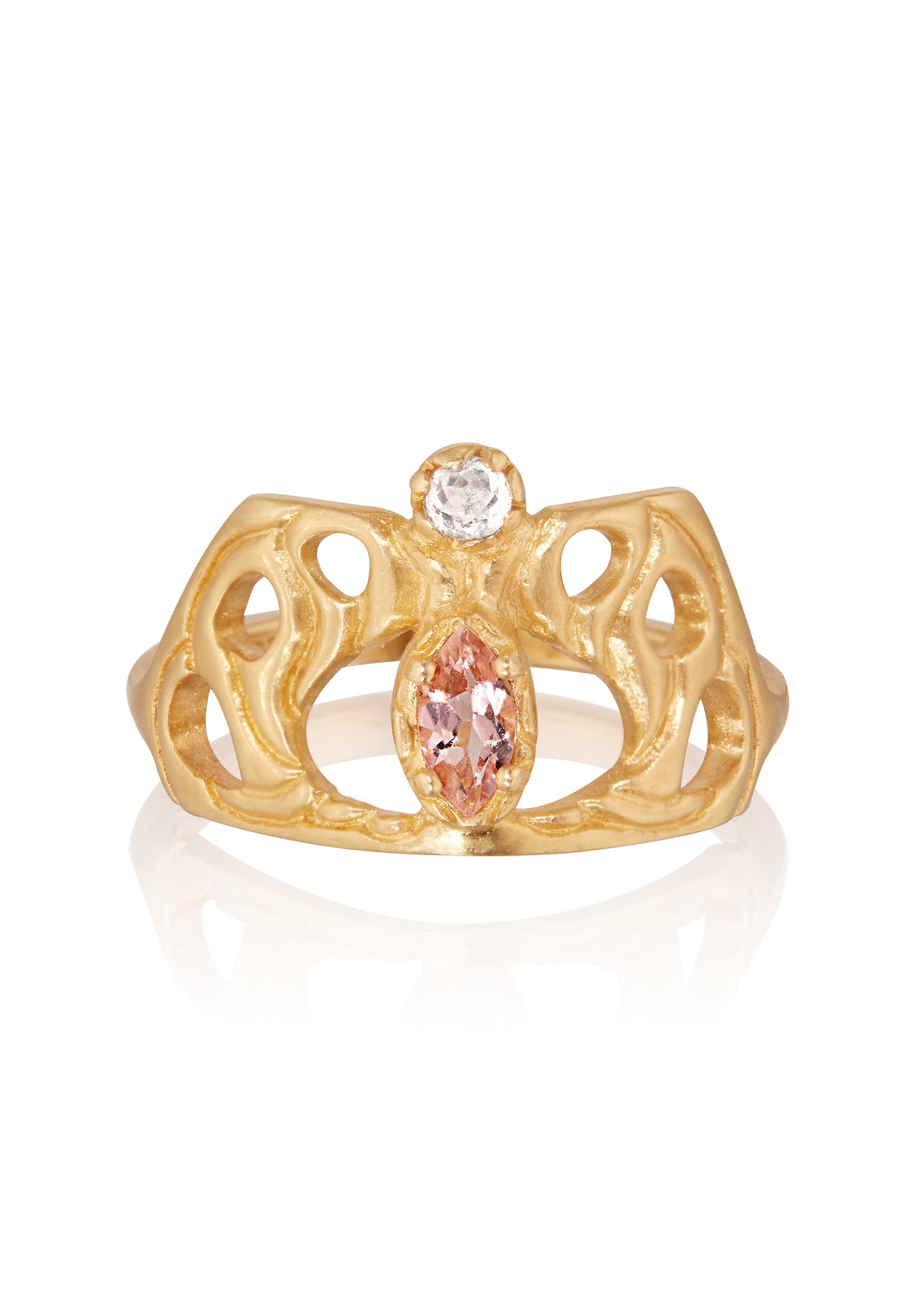 Framed by an intricate open-work pattern, the Anthea ring imagines the Greek goddess rendered in a window of stained glass, cradled by serpentine mullions of gleaming gold. A stunning tourmaline stone and rose cut diamond create a sensuous silhouette on this ring that bears her name.