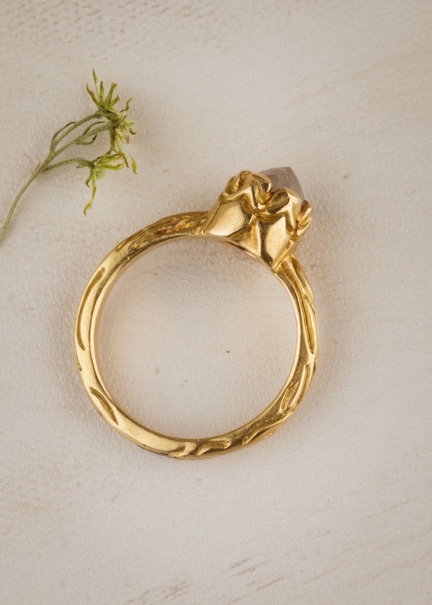 Inspired by windswept castles that emerge from the mist, the Turret ring rises high on the finger to reveal an exquisite rose cut diamond—a ring worthy of fairytales, created for the magic of real life.