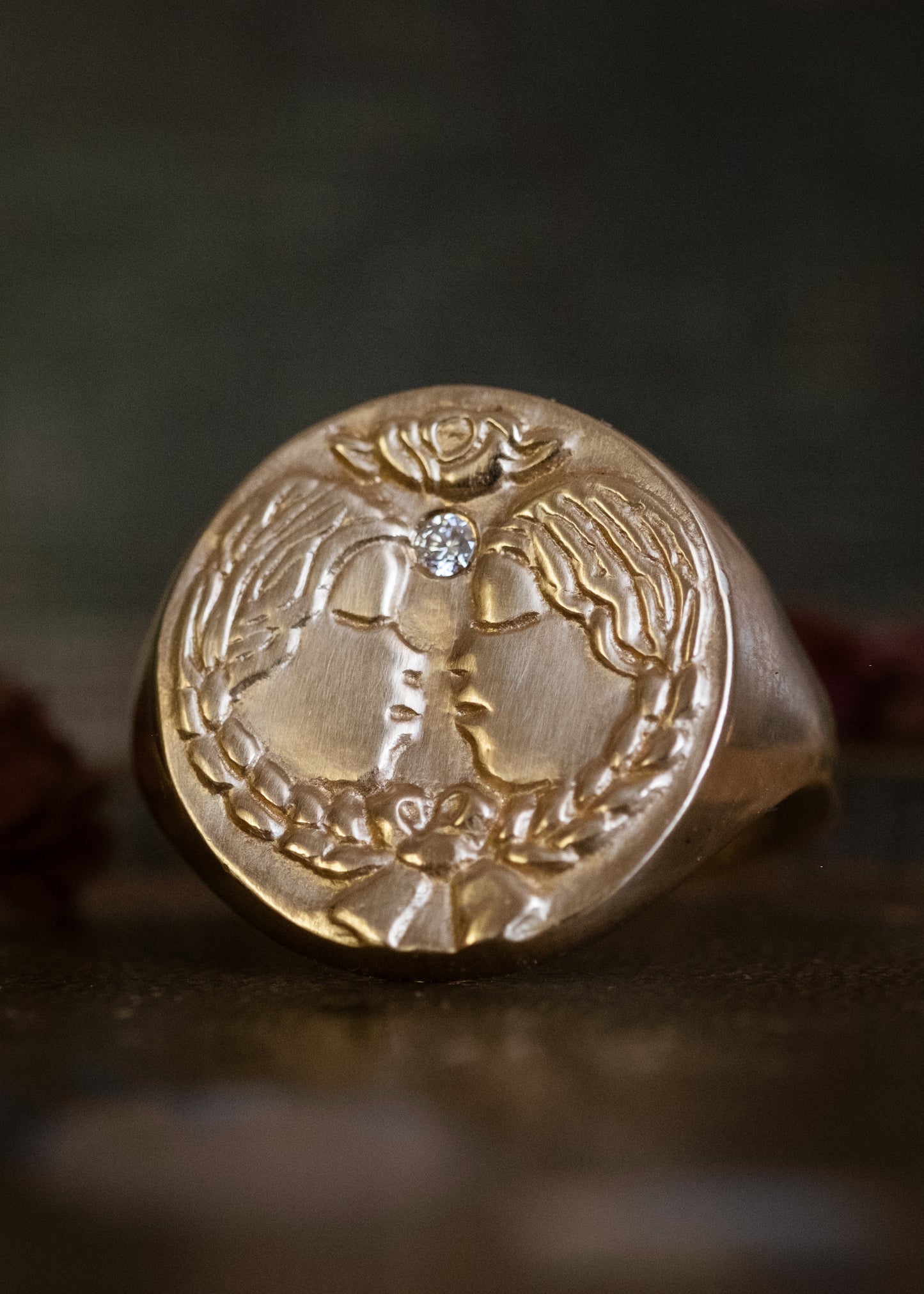 The third sign of the Zodiac, air sign Gemini is quick-witted and curious, with a dual personality that reflects an open mind. Hand-carved twins bound together by a ribbon are accented with a precious diamond for a ring that captures the power of the celestial sky.
