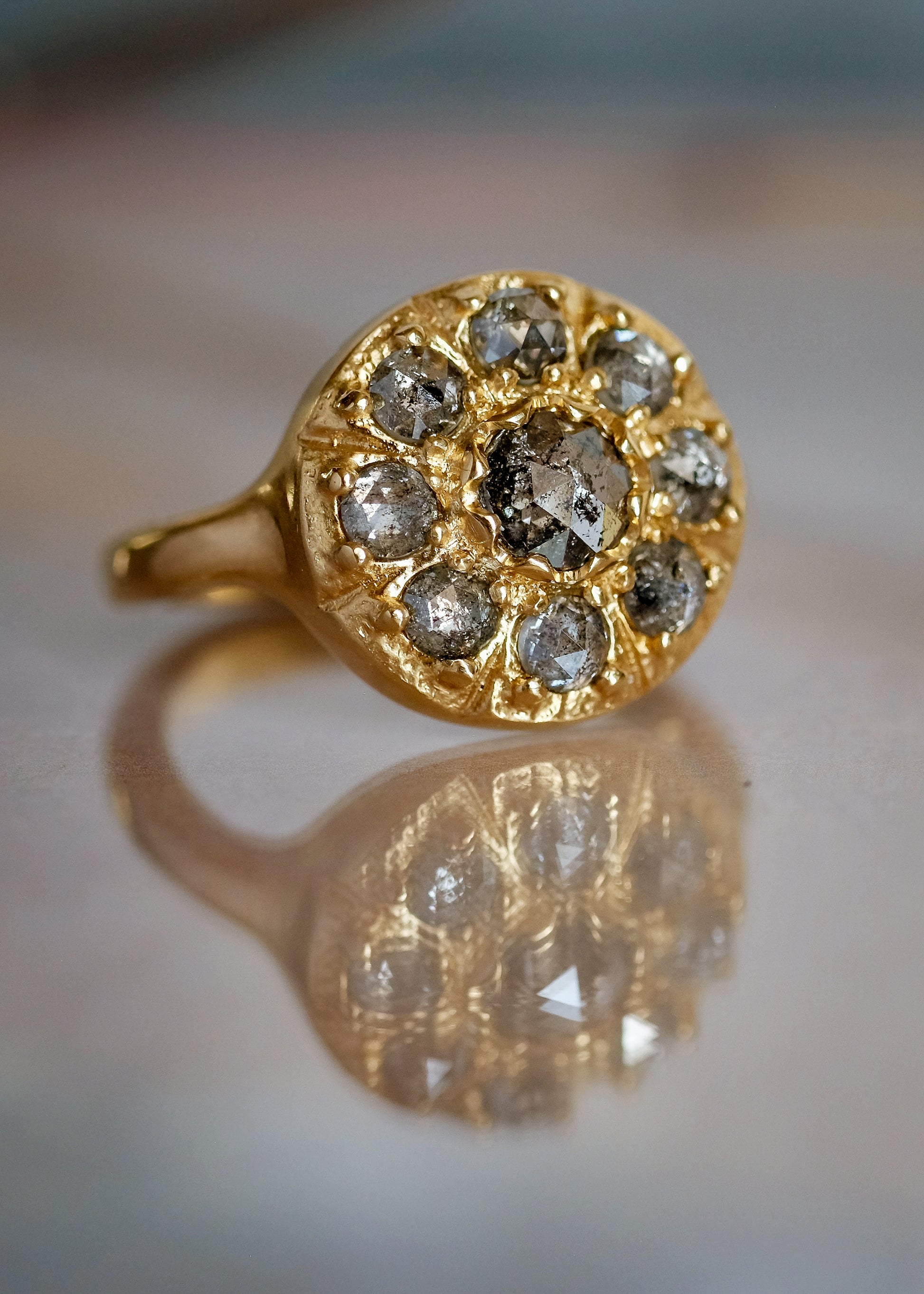 Capturing the richness and romance of its eponymous era, the Georgian ring boasts an exquisite arrangement of rose cut diamonds that celebrates the marriage between gold and stone. As timeless as it is beautiful, this piece is an instant heirloom—classic, ornate and otherworldly.