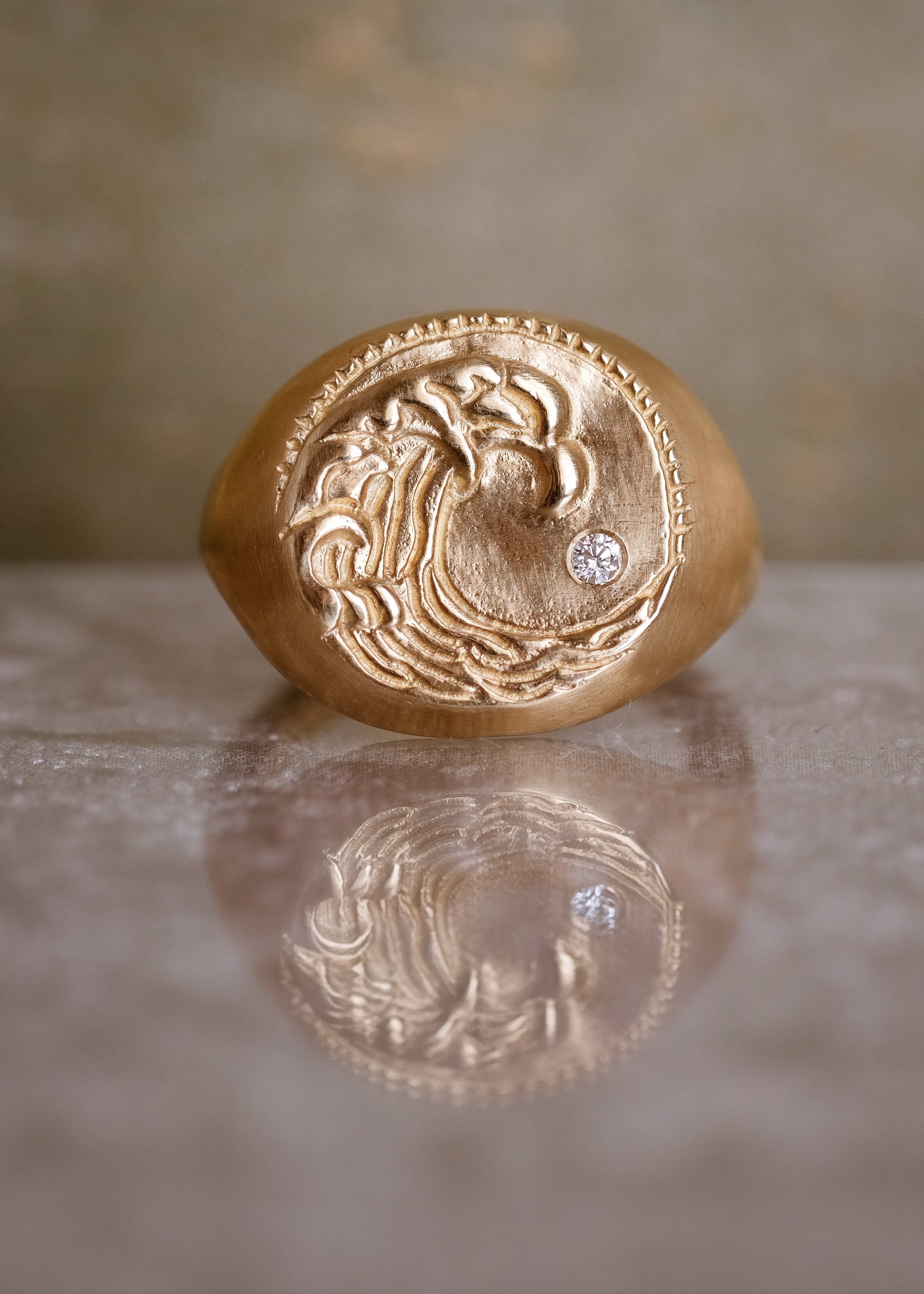 The eleventh sign of the Zodiac, air sign Aquarius is a deep thinker who wants to change the world. A hand-carved wave graces this pendant for a necklace that captures the power of the celestial sky.
