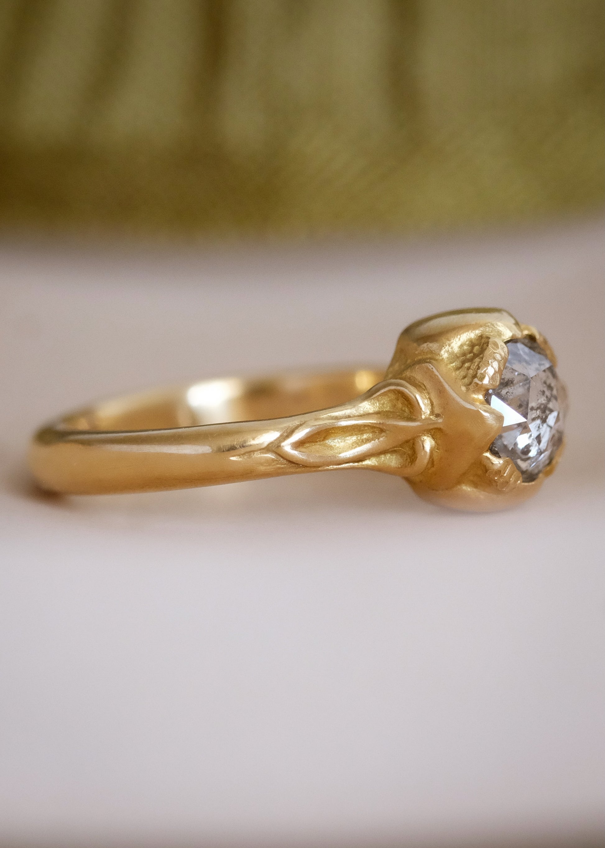 Taking its cue from nature, the Sepal ring captures the intricacy of layered flower petals rendered in gold, revealing a precious rose cut diamond—a refined piece that’s as timeless and beautiful as the botanical world.